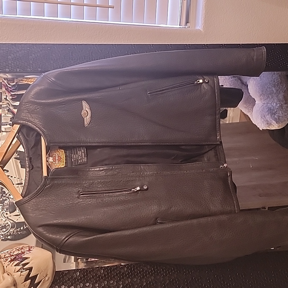 100th anniversary harley jacket. No offers will be taken.  Price is firm